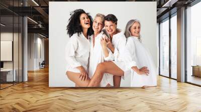 Female models of different ages celebrating their natural bodies Wall mural