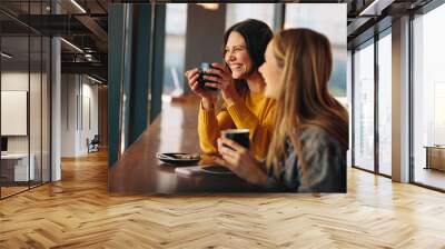 Friends having great time at a coffee shop Wall mural