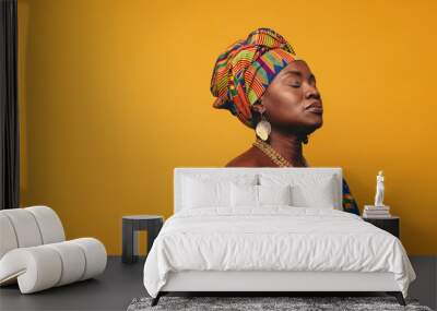 Ghanaian woman wearing traditional clothing in a studio Wall mural