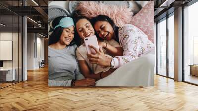 Girls having fun during a sleepover Wall mural