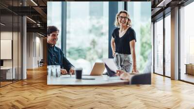 Group of business professionals in a productive discussion at a conference meeting Wall mural