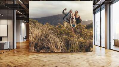 Group of creatives on hiking trip Wall mural