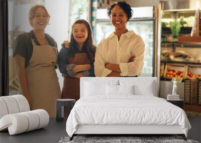 Group of diverse store workers smiling happily in a grocery store Wall mural