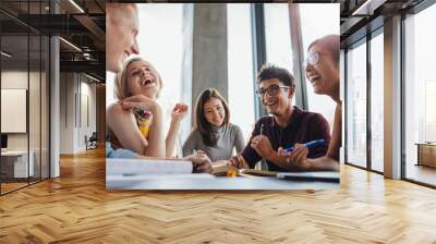 group of happy young students in library Wall mural