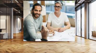 Happy design professionals having a meeting in an office Wall mural