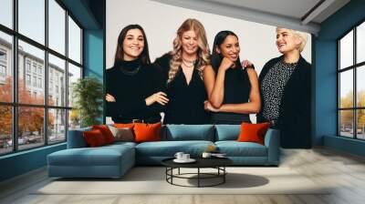 Happy group of women in a studio Wall mural