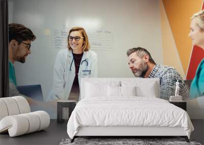 Hospital staff meeting in conference room Wall mural