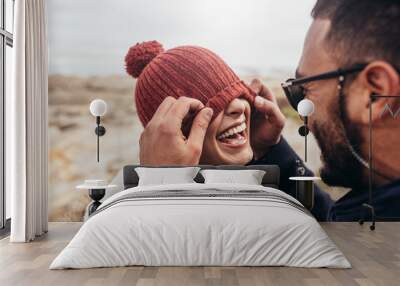 loving couple having fun outdoors Wall mural