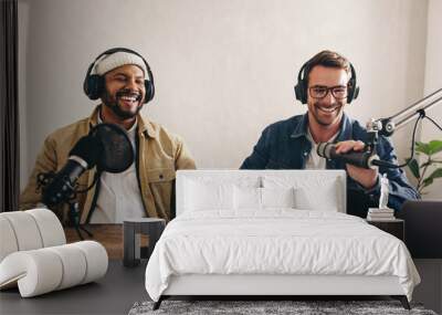 Male radio presenters having a great time in a studio Wall mural