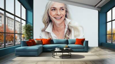 Mature woman with beautiful smile Wall mural