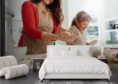 mother and child making cookies for christmas. Wall mural