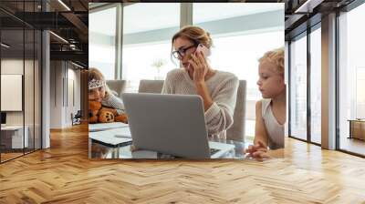 Mother working from home Wall mural