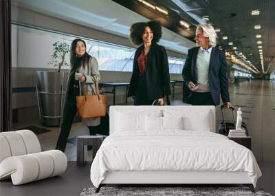 Multi ethnic people going on business trip Wall mural