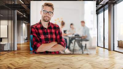 portrait of positive businessman in office Wall mural