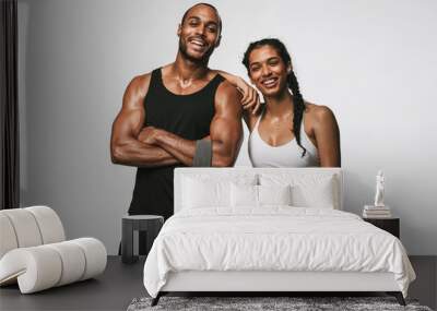 Portrait of smiling fitness couple Wall mural