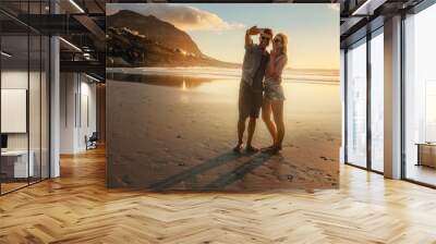 romantic young couple taking selfie at the beach Wall mural