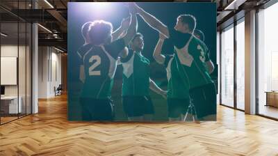 Rugby players celebrating championship win Wall mural