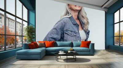 Stylish senior woman looking at copy space Wall mural