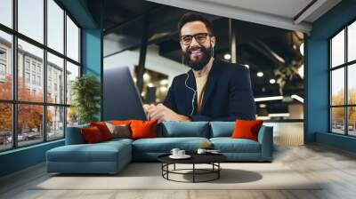 Successful entrepreneur smiling at the camera in an office Wall mural