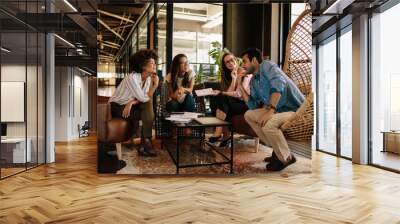 team of corporate professionals having discussion in meeting Wall mural