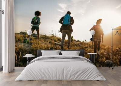 three young friends on a country hike Wall mural