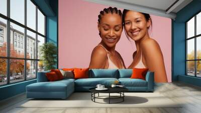 Two attractive mixed race women Wall mural