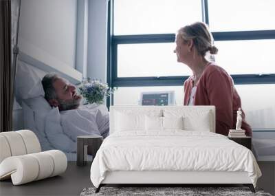 Wife visiting husband in hospital Wall mural