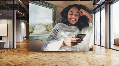 Woman enjoying on her road trip Wall mural