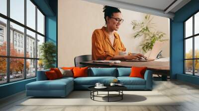 Woman working from home office Wall mural