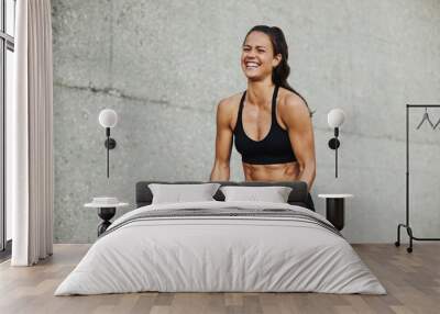 Woman working out with a medicine ball Wall mural