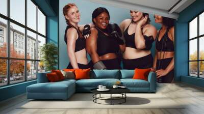 Women of different race and body size in sportswear Wall mural