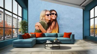 Young women having great time together Wall mural