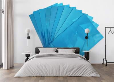 Blue, fanned out, advertising folders isolated on white background, with a copyspace. Wall mural