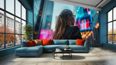 Businesswoman in city and graph Wall mural