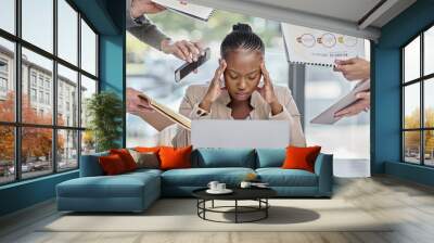 Business woman, overwhelmed and busy with headache, stress and laptop with chaos, project and schedule. Team, businesswoman and man with pc, anxiety or hands in office with noise, pressure or target Wall mural