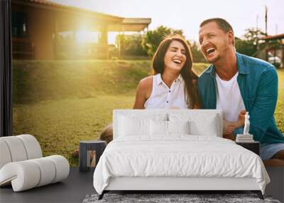 Their family is all about the love. Cropped shot of a young family spending time together outdoors. Wall mural