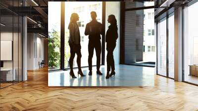 Bringing their bold business vision together. Shot of a group of businesspeople having a discussion in an office. Wall mural