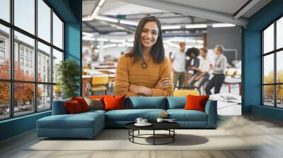 I have full confidence in my team and their ability. Cropped portrait of an attractive young businesswoman in the office with his colleagues in the background. Wall mural