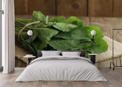 Fresh Green Herbs on a Rustic Wooden Surface Wall mural