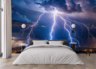 A dramatic shot of lightning striking the night sky, storm, thunder, electricity, weather, power, nature, dramatic, atmospheric Wall mural