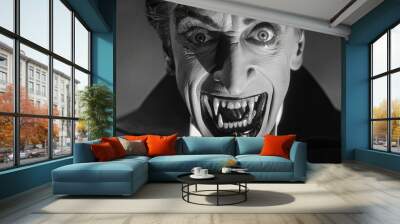 Black and white portrait of an elderly Caucasian man with a sinister smile in a vintage setting. Concept of horror, villain, vintage style, classic film character Wall mural