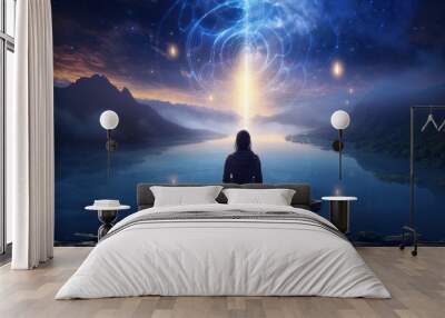 Brunette woman sitting with her back against the backdrop of beautiful cosmic nature landscape. Mystical atmosphere. Concept of filling with energy and vitality. Zen Buddhism. Mental health Wall mural