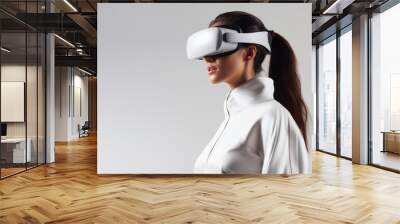 Caucasian brunette woman in virtual reality glasses on white background. Copy space. Banner template of person in white VR goggles. Concept of technology, game, entertainment, artificial intelligence Wall mural