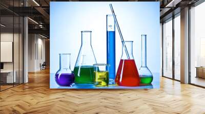 Chemical glasswares with colored liquids inside bottles Wall mural