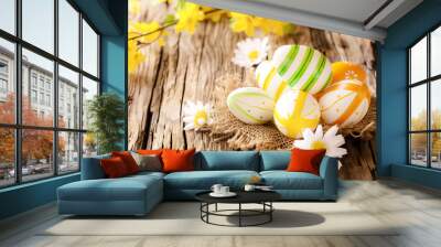 Easter eggs in nest on wooden surface Wall mural