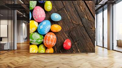 Easter eggs on wooden background Wall mural