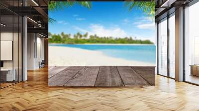 Empty wooden planks with blur beach on background Wall mural