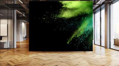 Explosion of colored powder on black background Wall mural