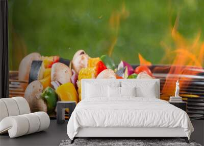 Grilled vegetarian skewers on fire Wall mural