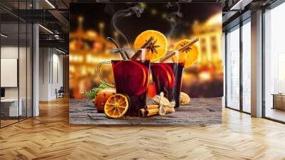 Hot red wine drinks on wooden table Wall mural